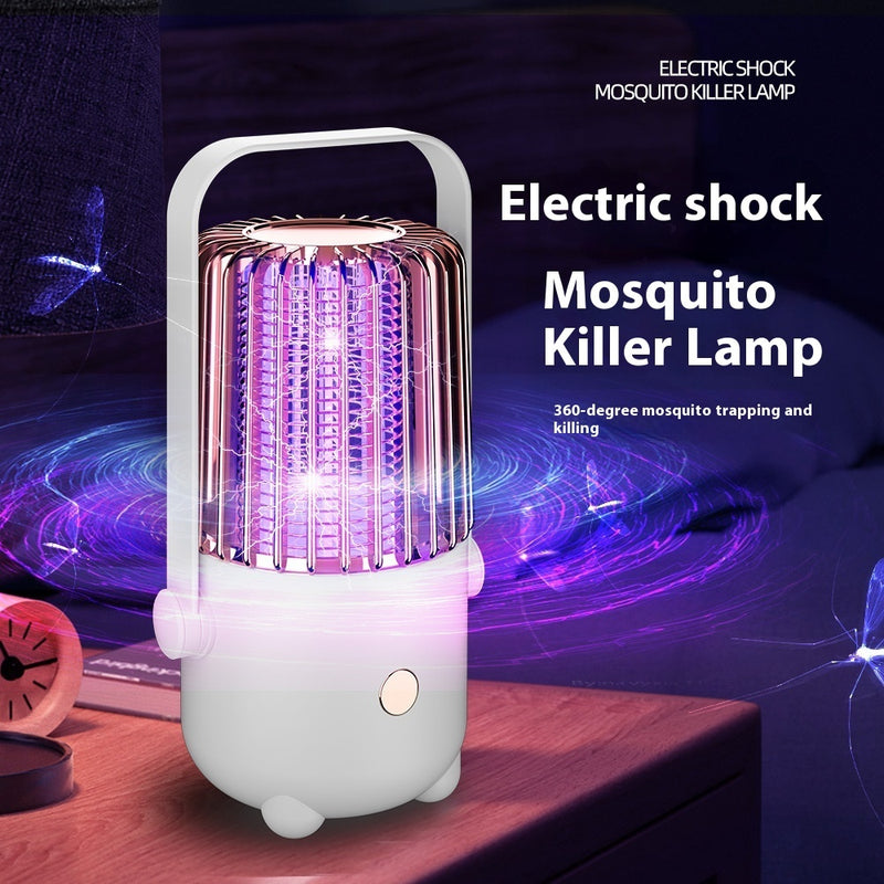 Electric shock mosquito killer lamp with purple light on a dark background